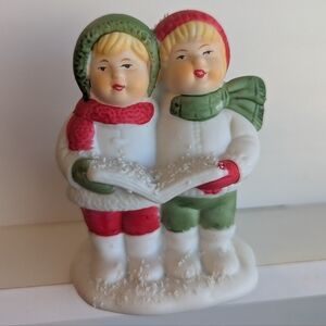Charming Holiday Figurine with Red and Green Accents